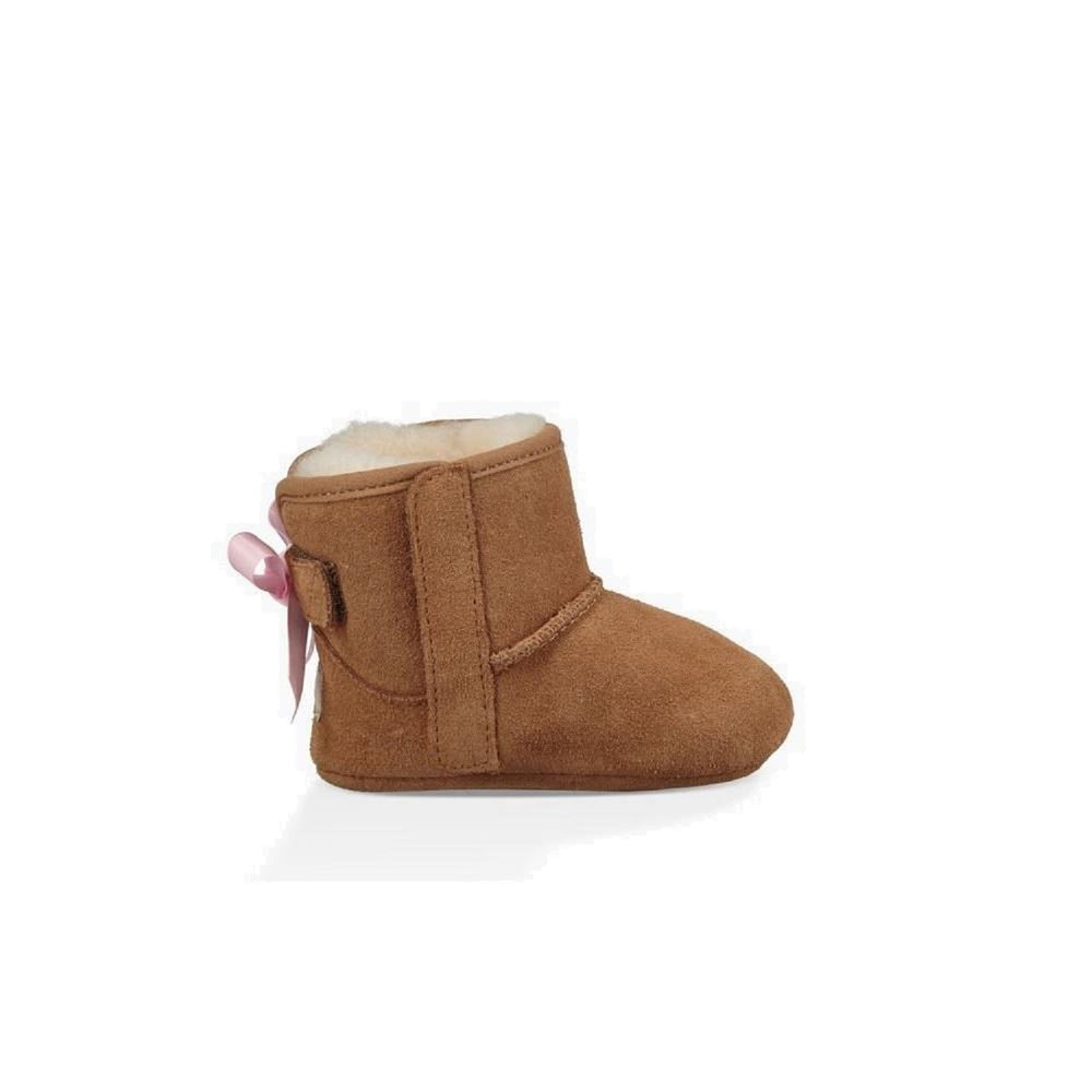 Adorable bootie for toddlers with pink satin bow and color is chestnut.