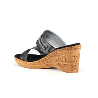Two strap high heel slide in black with cork wedge.