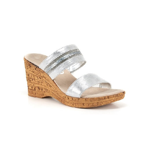 Two strap high heel slide in silver with cork wedge.