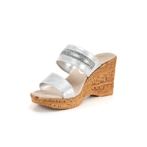 Two strap high heel slide in silver with cork wedge.