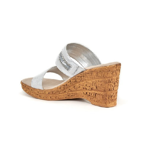 Two strap high heel slide in silver with cork wedge.