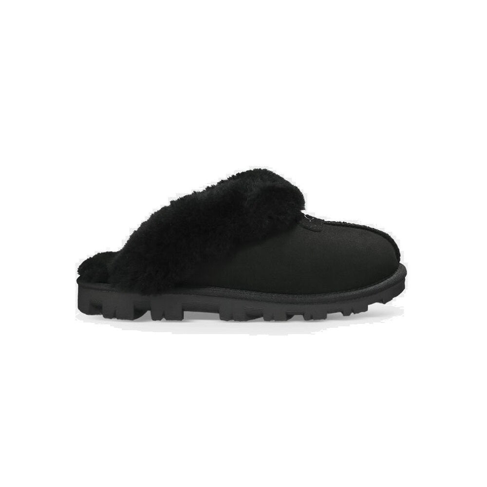 UGG Coquette closed toe slipper with sheepskin lining in black.